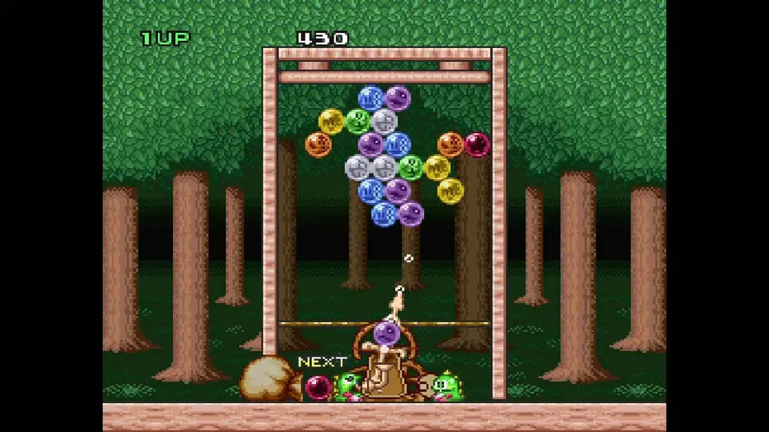 泡泡龙16位主机版 .Puzzle Bobble Bust-a-Move (16-Bit Console Version) 游戏内截图1 闯关 街机 益智 冒险
